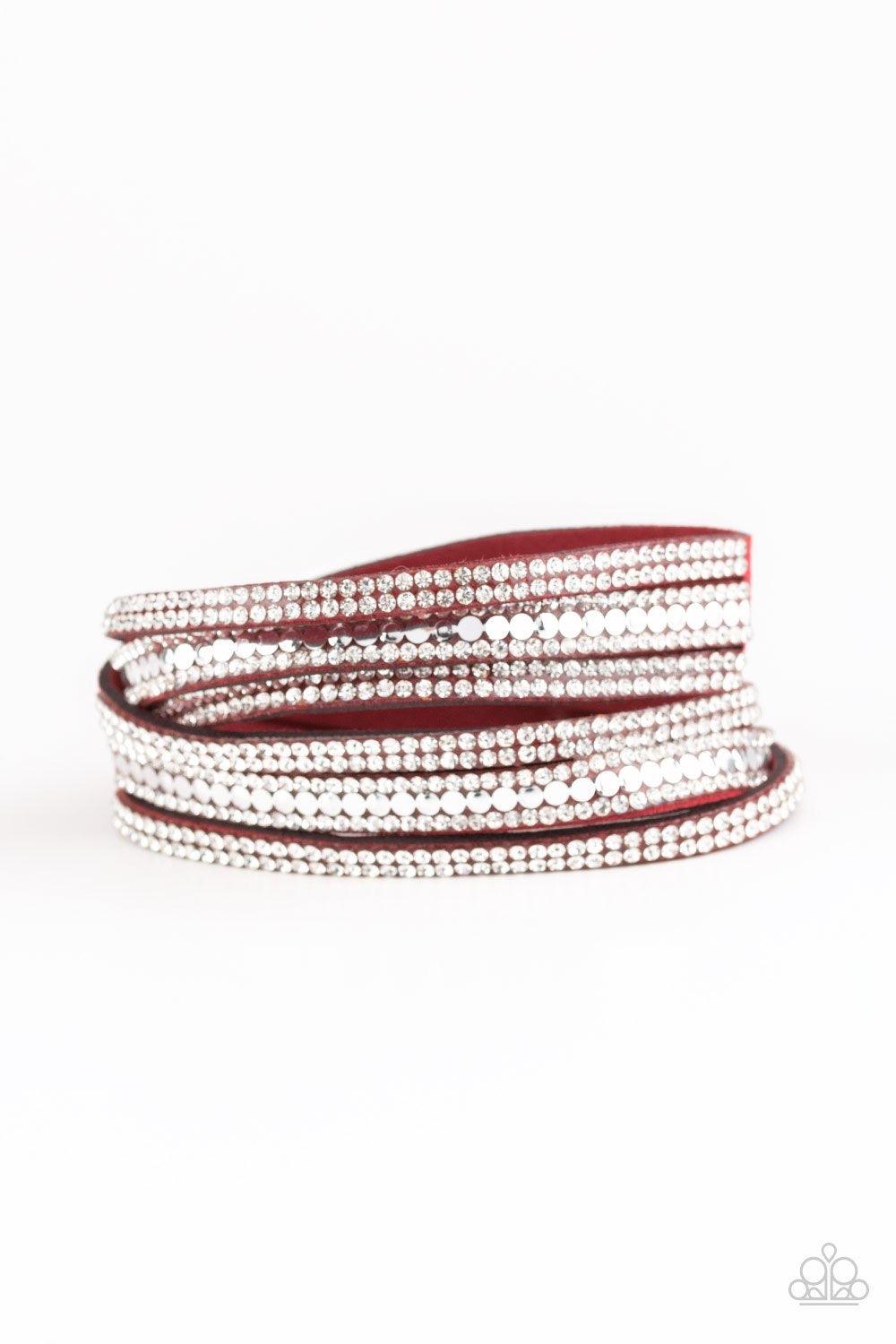 Paparazzi Accessories Rock Star Attitude - Red Encrusted in rows of glassy white rhinestones and flat silver studs, three strands of red suede wrap around the wrist for a sassy look. The elongated band allows for a trendy double wrap around the wrist. Fea