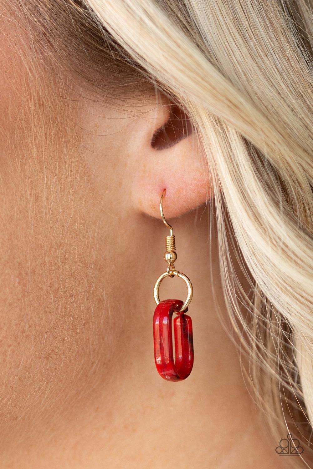 Paparazzi Accessories Fashionista Fever - Red Glistening gold fittings link with red hexagon-like acrylic frames below the collar for a seasonal flair. Features an adjustable clasp closure Jewelry