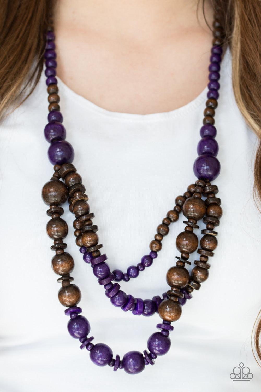 Paparazzi Accessories Rio Rainbows - Purple Brushed in playful purple and earthy brown finishes, vivacious wooden beads and discs are threaded along strands of shiny brown cording for a summery look. Jewelry