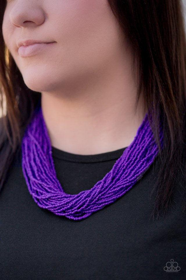Paparazzi Accessories The Show Must CONGO On - Purple Infused with two bold silver fittings, countless strands of vivacious purple seed beads drape below the collar for a seasonal look. Features an adjustable clasp closure. Jewelry