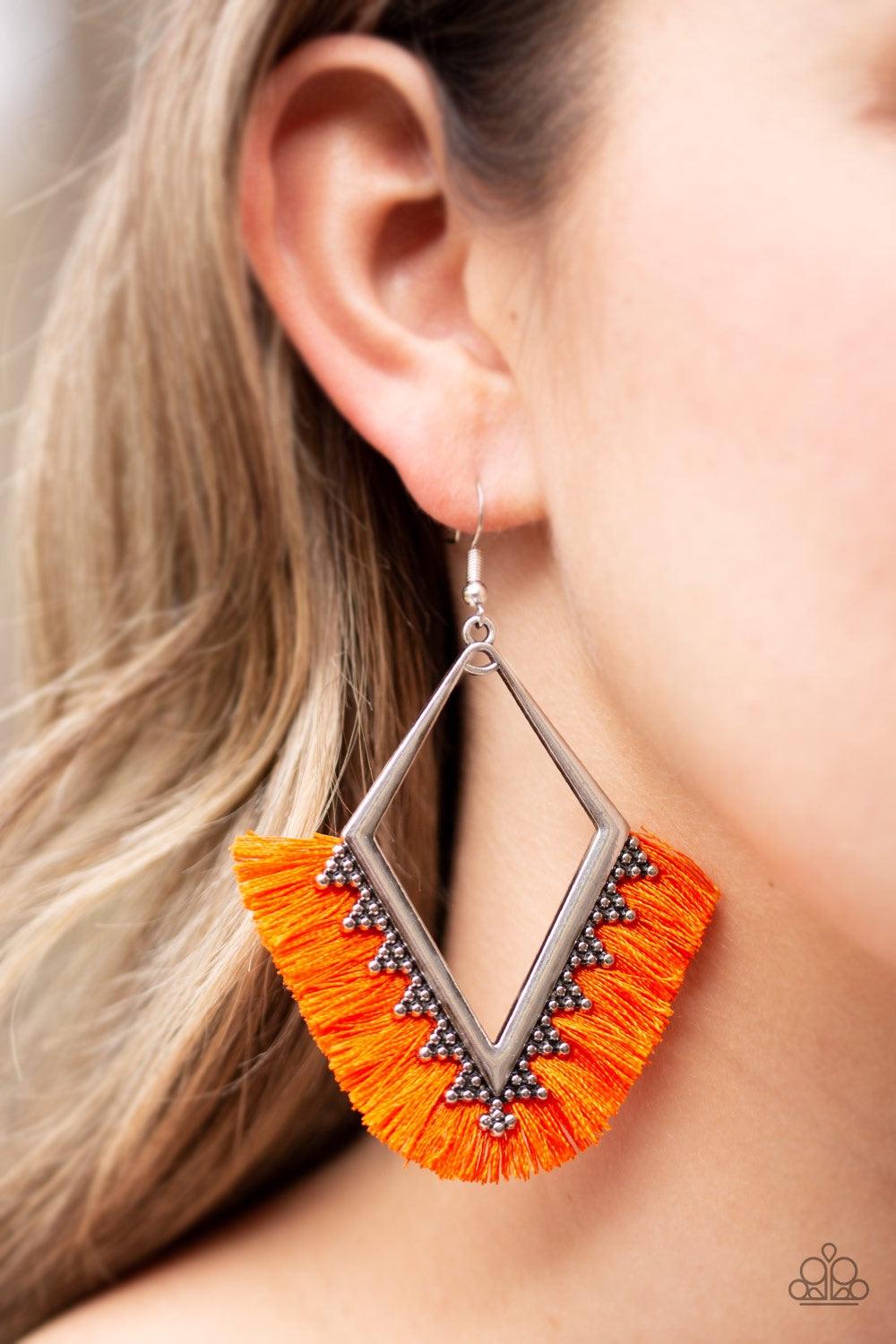 Paparazzi Accessories When in Peru - Orange A fan of shiny orange thread flares out from the bottom of a kite-shaped silver frame radiating with studded details for a flirtatious look. Earring attaches to a standard fishhook fitting. Jewelry