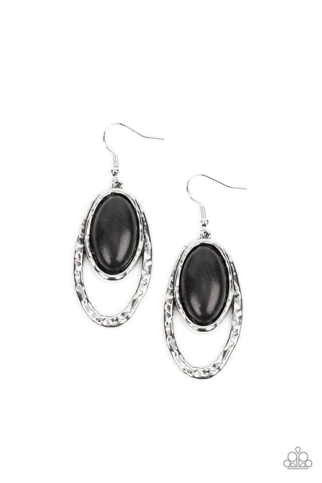 Paparazzi Accessories Pasture Paradise - Black An oval black stone is pressed into a hammered silver fitting that attaches to the top of a hammered silver oval frame, creating a rustic lure. Earring attaches to a standard fishhook fitting. Earrings