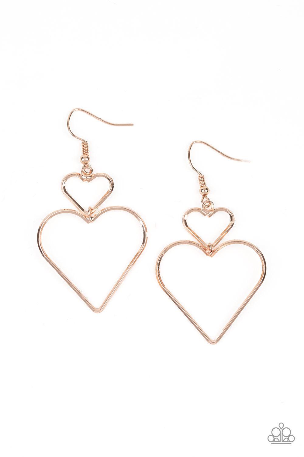 Paparazzi Accessories Heartbeat Harmony - Rose Gold A large rose gold heart silhouette swings from the bottom of a dainty rose gold heart silhouette, creating a charming lure. Earring attaches to a standard fishhook fitting. Jewelry