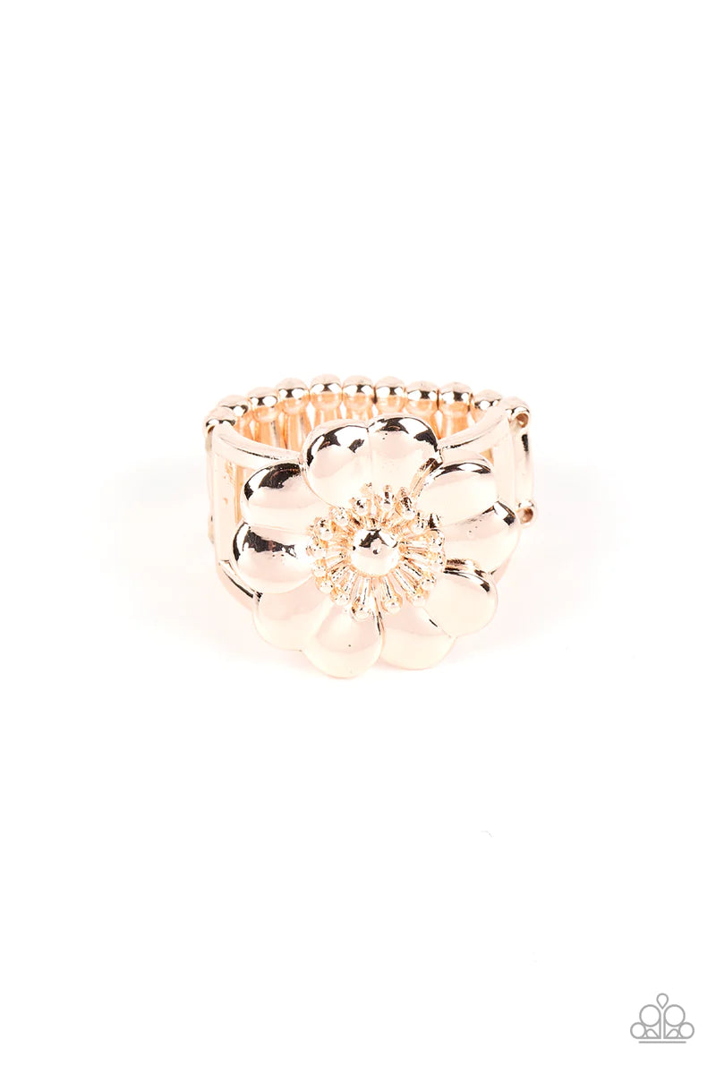 Paparazzi Accessories Floral Farmstead - Rose Gold Folds of heart shaped rose gold petals gather around a pronged and studded center, blooming into a whimsical floral centerpiece atop the finger. Features a stretchy band for a flexible fit. Sold as one in