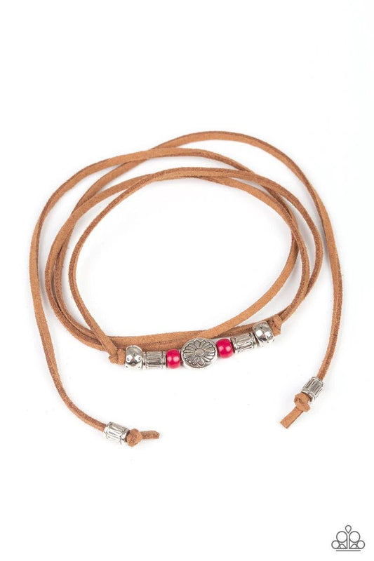 Paparazzi Accessories Clear A Path - Pink An array of pink and silver beads are knotted in place along elongated suede cording for a wanderlust fashion. To secure bracelet, tie ends in place around the wrist at desired length. Sold as one individual brace