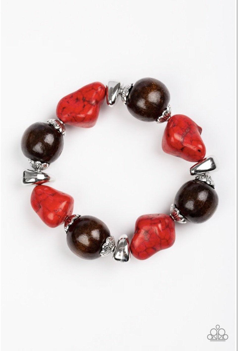 Paparazzi Accessories Gorgeously Grounded - Red Infused with ornate silver accents, red stones and earthy wooden beads are threaded along a stretchy elastic band for a seasonal look. Sold as one individual bracelet. Jewelry