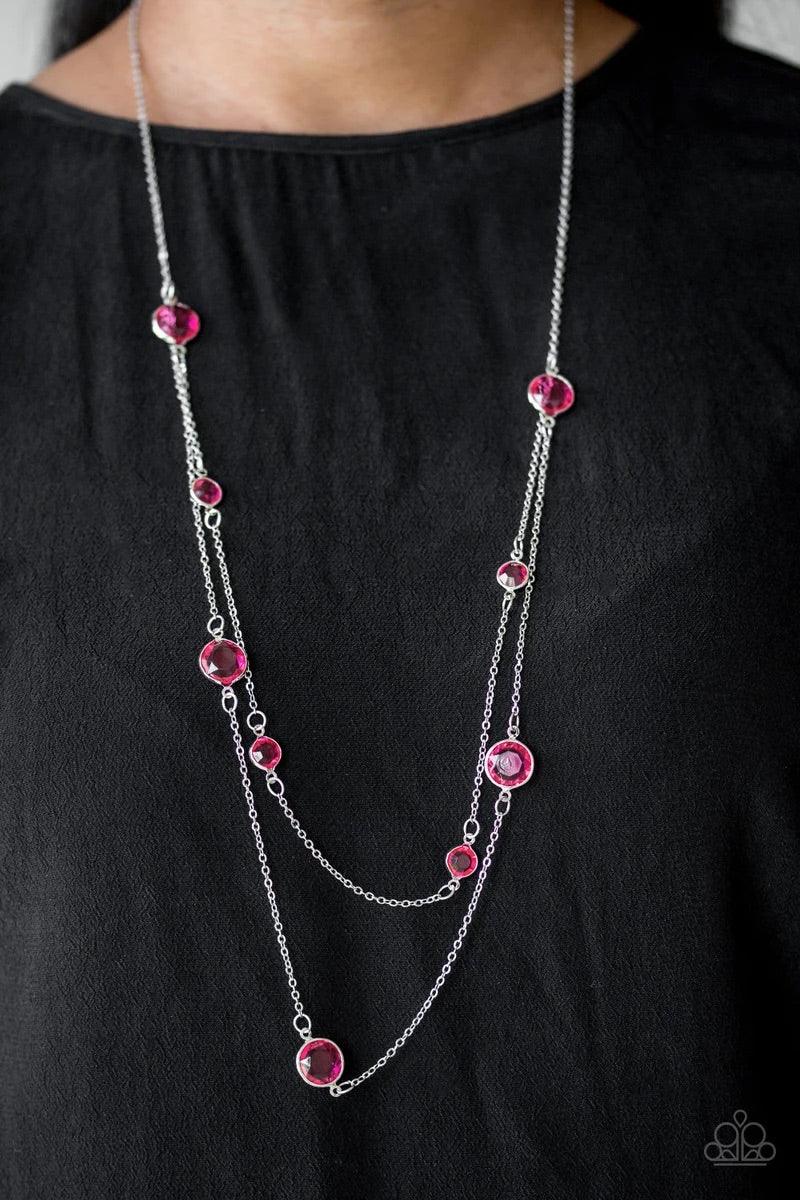 Paparazzi Accessories Raise Your Glass - Pink Varying in size, glassy pink gems trickle along dainty silver chains, creating sparkling layers across the chest. Features an adjustable clasp closure. Jewelry
