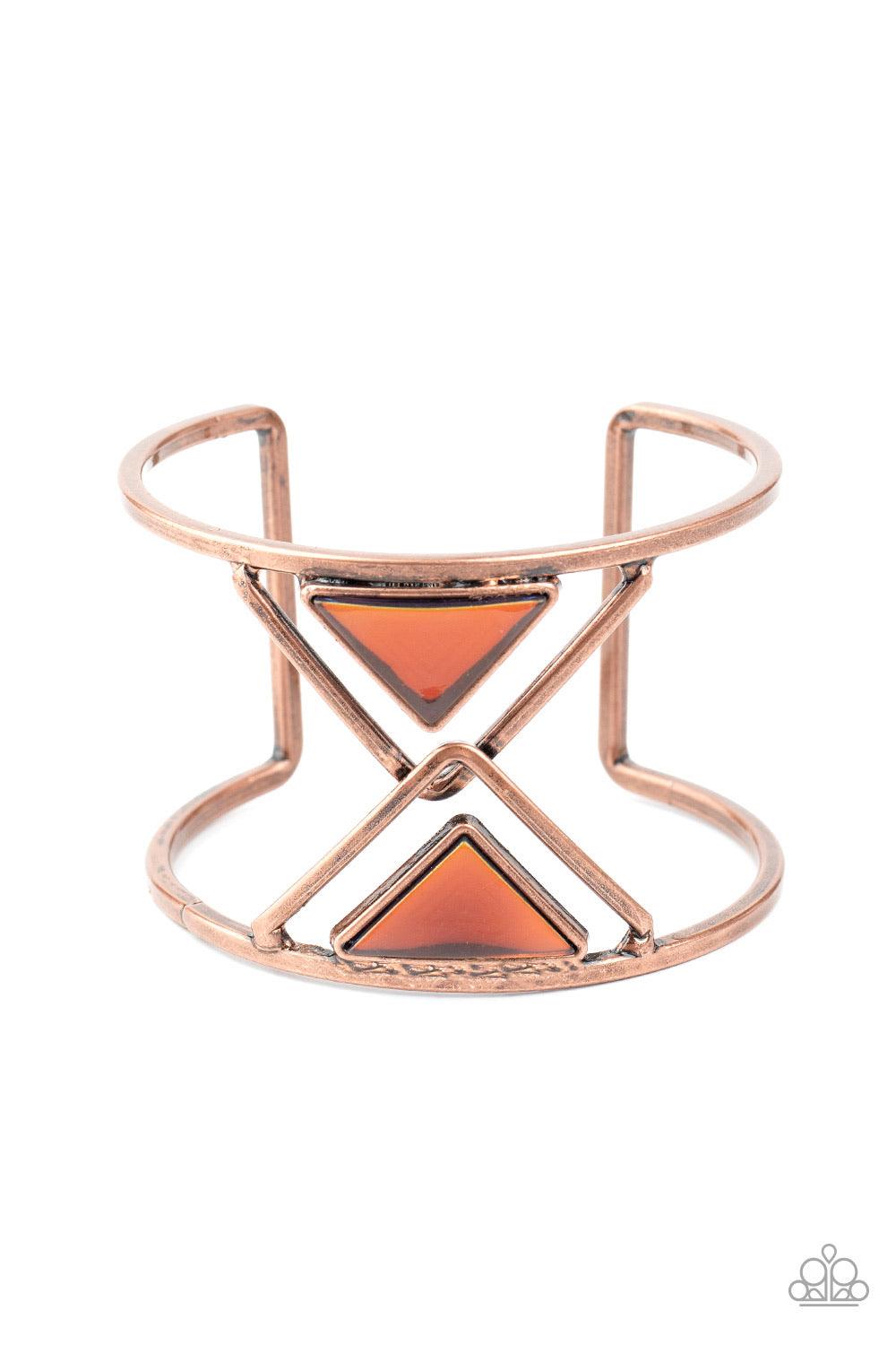 Paparazzi Accessories Pyramid Palace - Copper Featuring an oil spill finish, a pair of coppery acrylic triangles dot the centers of two overlapping copper triangle frames inside an airy silver cuff for an edgy fashion. Sold as one individual bracelet. Jew