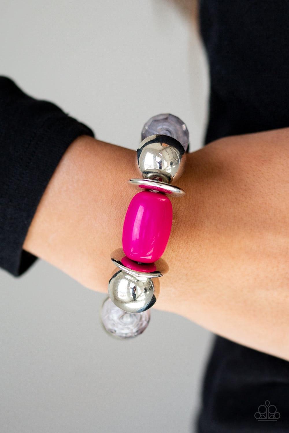 Paparazzi Accessories BAY After BAY - Pink Dramatic silver, vibrant pink, and faceted cloudy beads are threaded along a stretchy elastic band, creating a seasonal look around the wrist. Jewelry