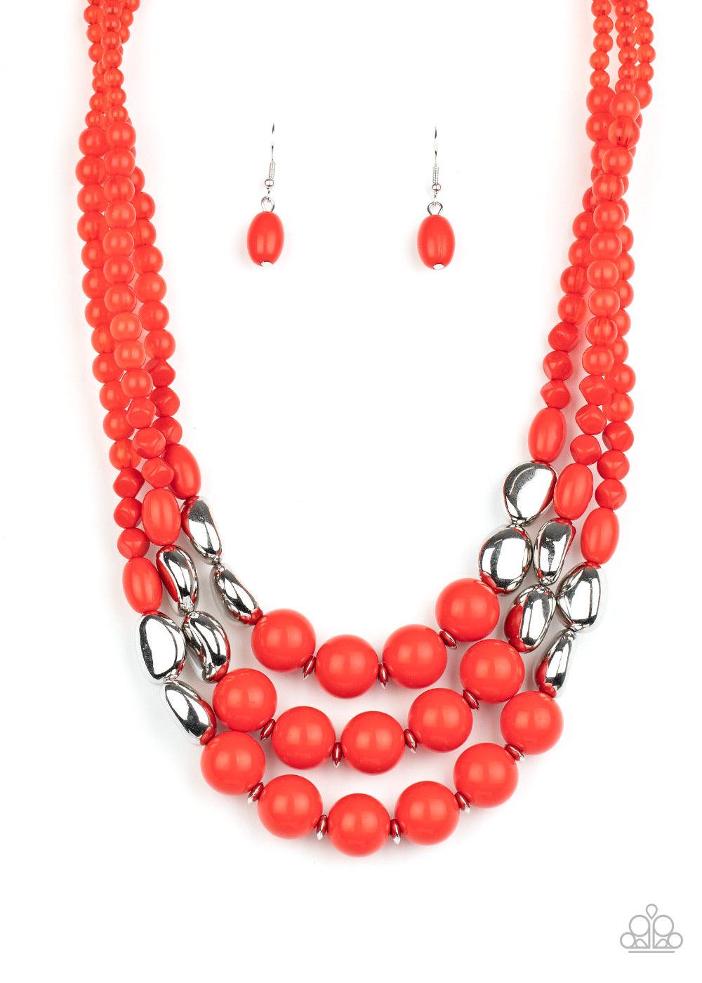 Paparazzi Accessories Flamingo Flamboyance - Red Featuring opaque and polished finishes, a mismatched collection of red and silver beads are threaded along invisible wires, creating colorful layers below the collar. Features an adjustable clasp closure. S