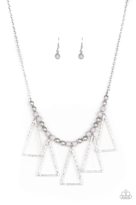 Paparazzi Accessories Terra Nouveau - Silver A collection of shiny silver and polished gray beads are threaded along an invisible wire below the collar. Hammered triangular frames swing from the bottom of the colorful compilation, creating an artistic fri