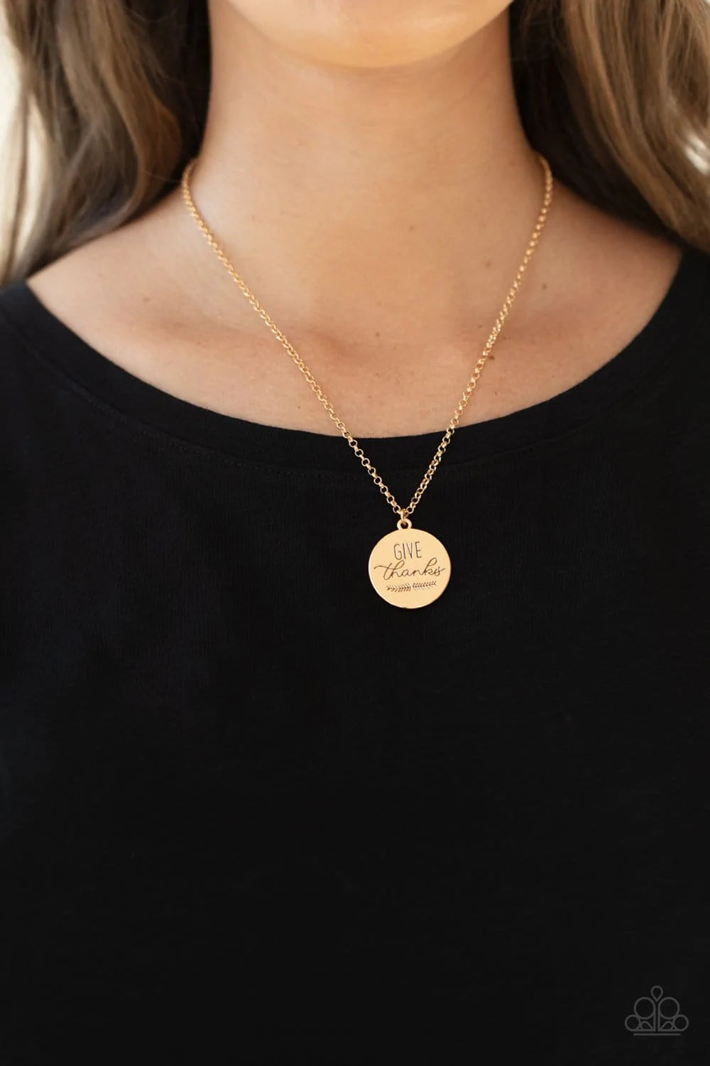 Paparazzi Accessories Give Thanks - Gold Infused with feathery accents, a shiny gold disc is stamped in the phrase, "Give Thanks," at the bottom of a shimmery gold chain. Features an adjustable clasp closure. Sold as one individual necklace. Includes one