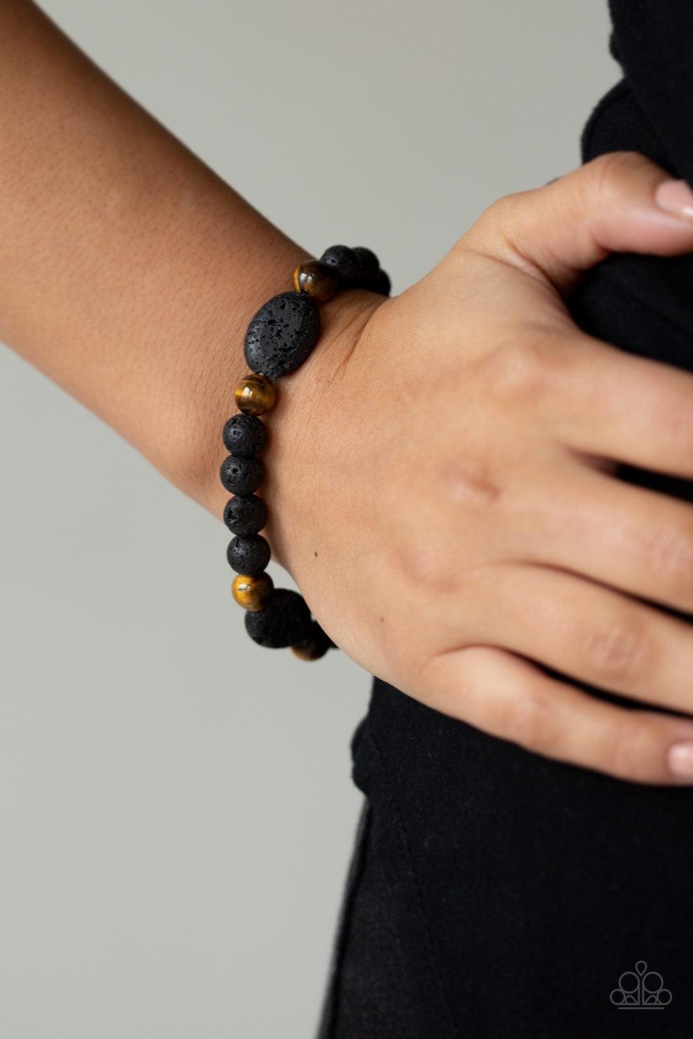 Paparazzi Accessories A Hundred And Zen Percent - Brown A collection of black lava rocks and earthy Tiger's Eye stone beads are threaded along a stretchy band around the wrist for a seasonal look. Jewelry