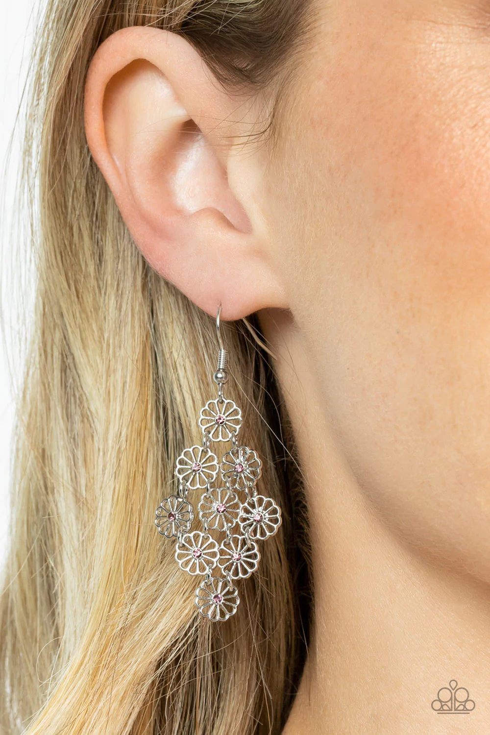 Paparazzi Accessories Bustling Blooms - Purple Dotted with dainty purple rhinestone centers, an airy collection of stenciled silver flowers link into a whimsical floral lure. Earring attaches to a standard fishhook fitting. Sold as one pair of earrings. J