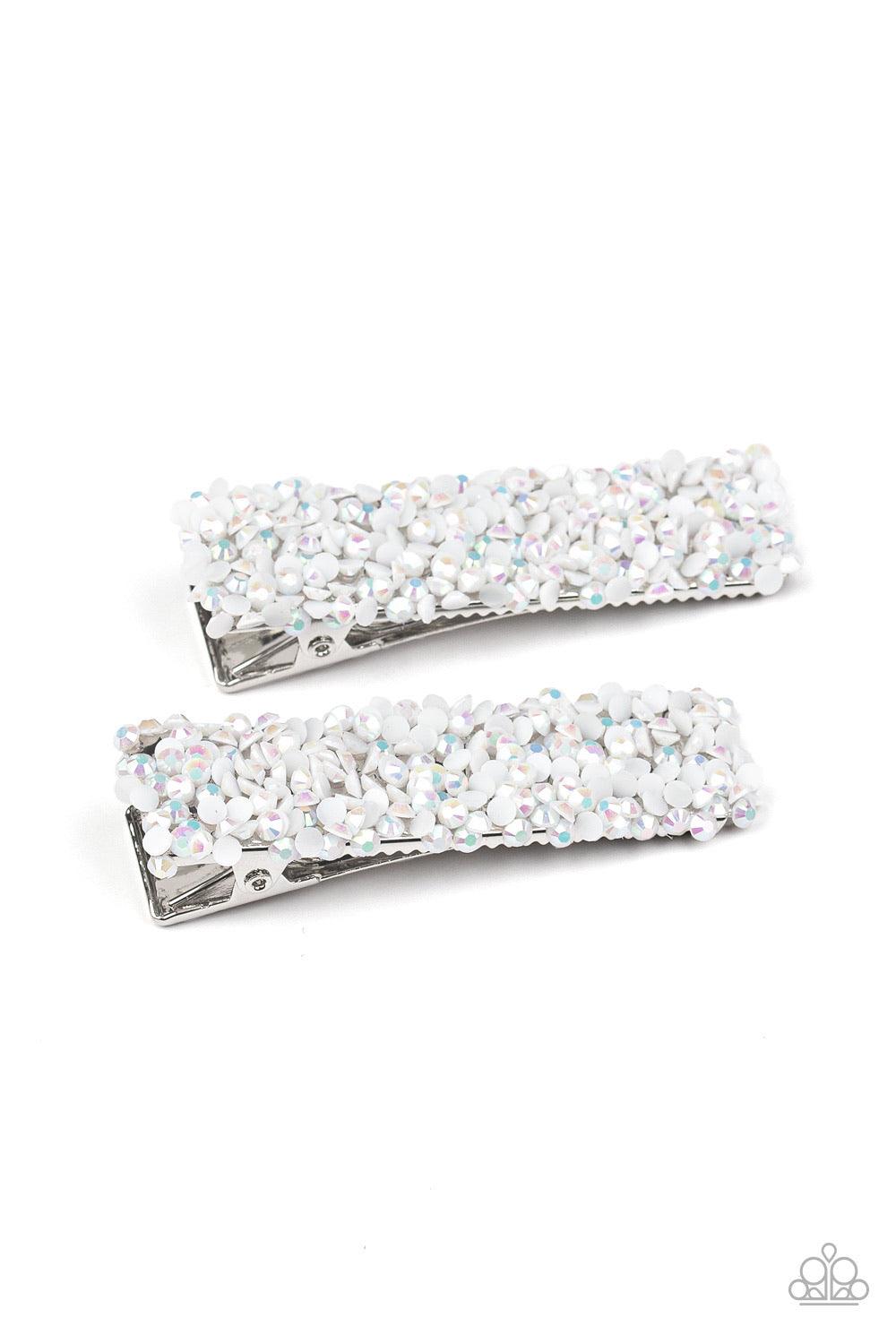 Paparazzi Accessories HAIR Comes Trouble - White Featuring a milky iridescence, dainty white rhinestones are sprinkled across two rectangular silver frames, creating a flirtatious pair of hair clips. Features a standard hair clip on the back. Sold as one