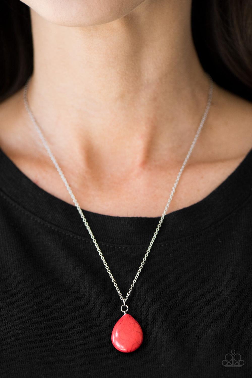 Paparazzi Accessories Stone Solo - Red Chiseled into a tranquil teardrop, a bright red stone swings from the bottom of a silver chain, creating an earthy pendant below the collar. Features an adjustable clasp closure. Jewelry