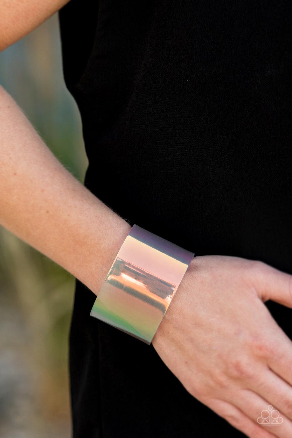 Paparazzi Accessories Holographic Aura - Multi Featuring a holographic shimmer, a thick multicolored acrylic cuff wraps around the wrist for a retro inspired fashion. Jewelry