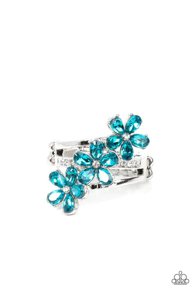 Paparazzi Accessories Posh Petals - Blue Dotted with dainty white rhinestone centers, blue rhinestone petaled floral frames slant across layers of plain silver and white rhinestone encrusted silver bands for a sparkly efflorescence. Features a stretchy ba