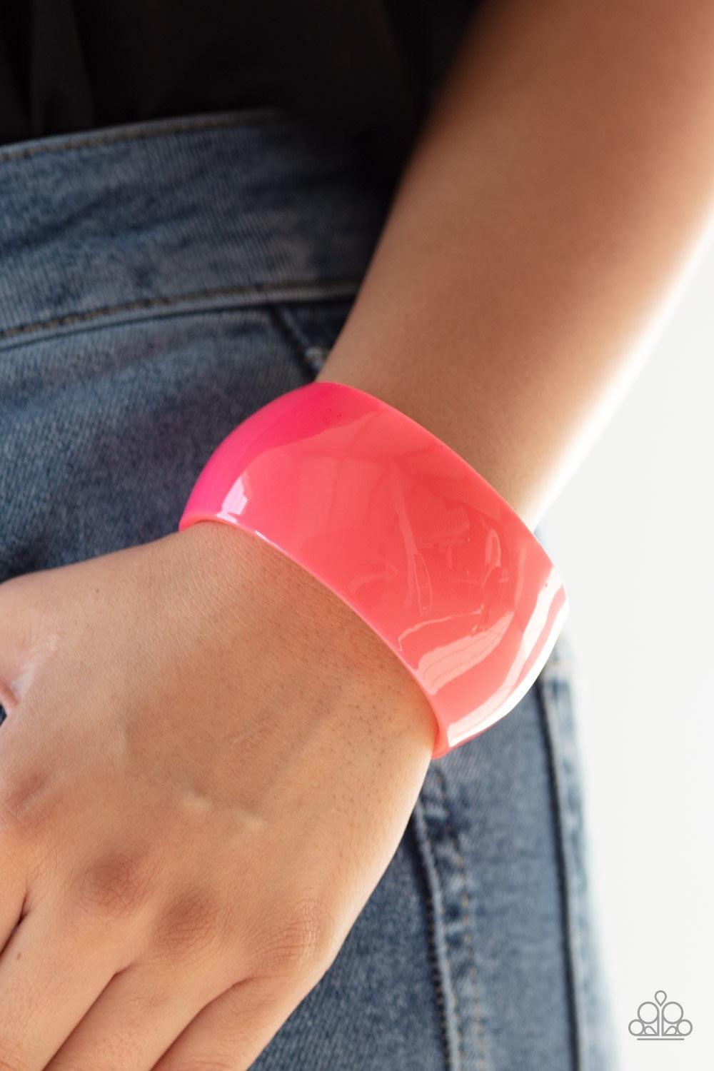 Paparazzi Accessories Fluent In Flamboyance - Pink A flamboyant pink acrylic cuff curls around the wrist for a colorfully retro look. Jewelry