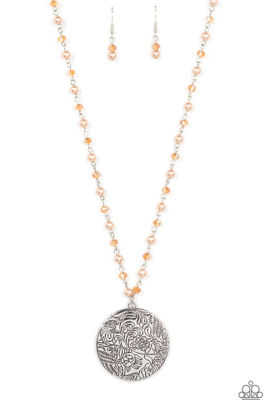 Paparazzi Accessories Secret Cottage - Brown An oversized silver disc stamped in a whimsical floral motif swings from the bottom of a pearly and crystal-like brown beaded chain, resulting in a romantic cottagecore inspired pendant. Features an adjustable