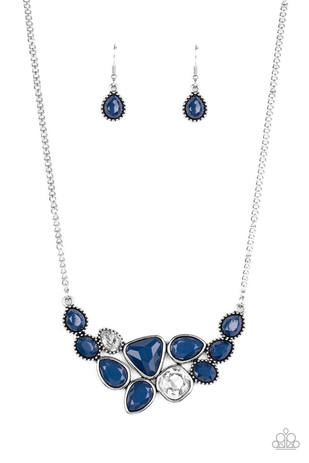 Paparazzi Accessories Breathtaking Brilliance - Blue Featuring smooth and studded silver frames, a collection of teardrop, oval, and triangular blue beads coalesce with matching white rhinestones below the collar for a glamorous pop of collar. Features an