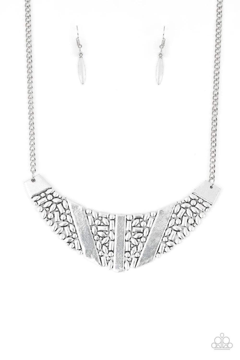 Paparazzi Accessories Terra Trailbreaker - Silver Varying in shape, a collection of dainty silver frames coalesce into a striking crescent pendant below the collar for a statement making look. Features an adjustable clasp closure. Sold as one individual n