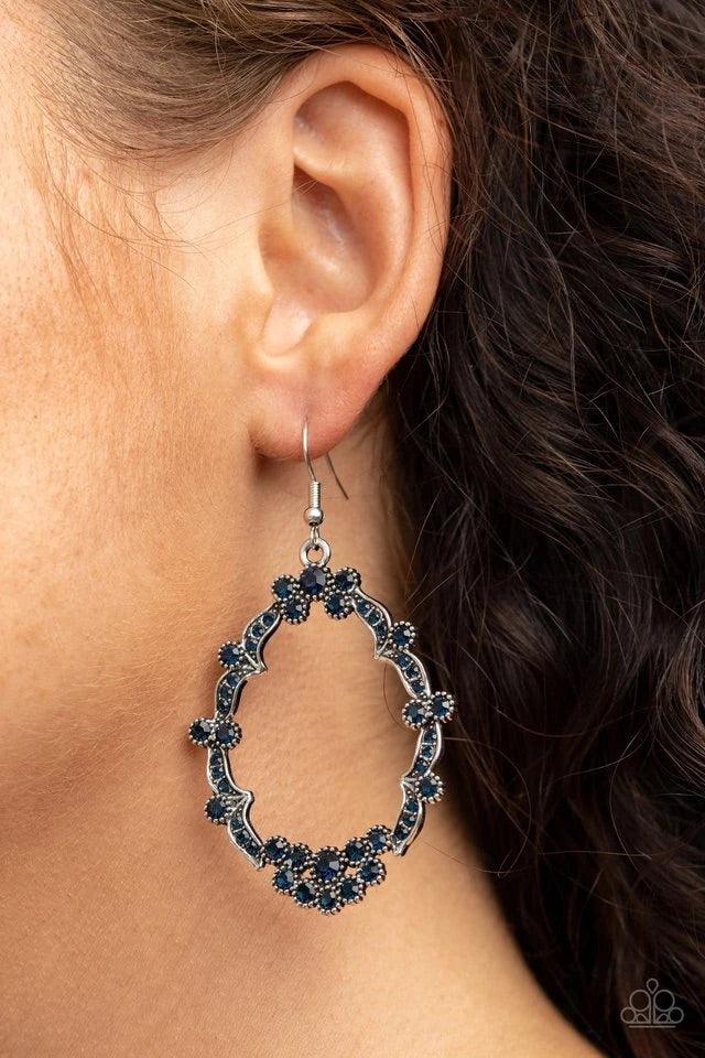 Paparazzi Accessories Sparkly Status - Blue Dotted with glittery blue rhinestones, dainty silver studded frames delicately connect into an imperfect teardrop frame for a whimsical shimmer. Earring attaches to a standard fishhook fitting. Sold as one pair