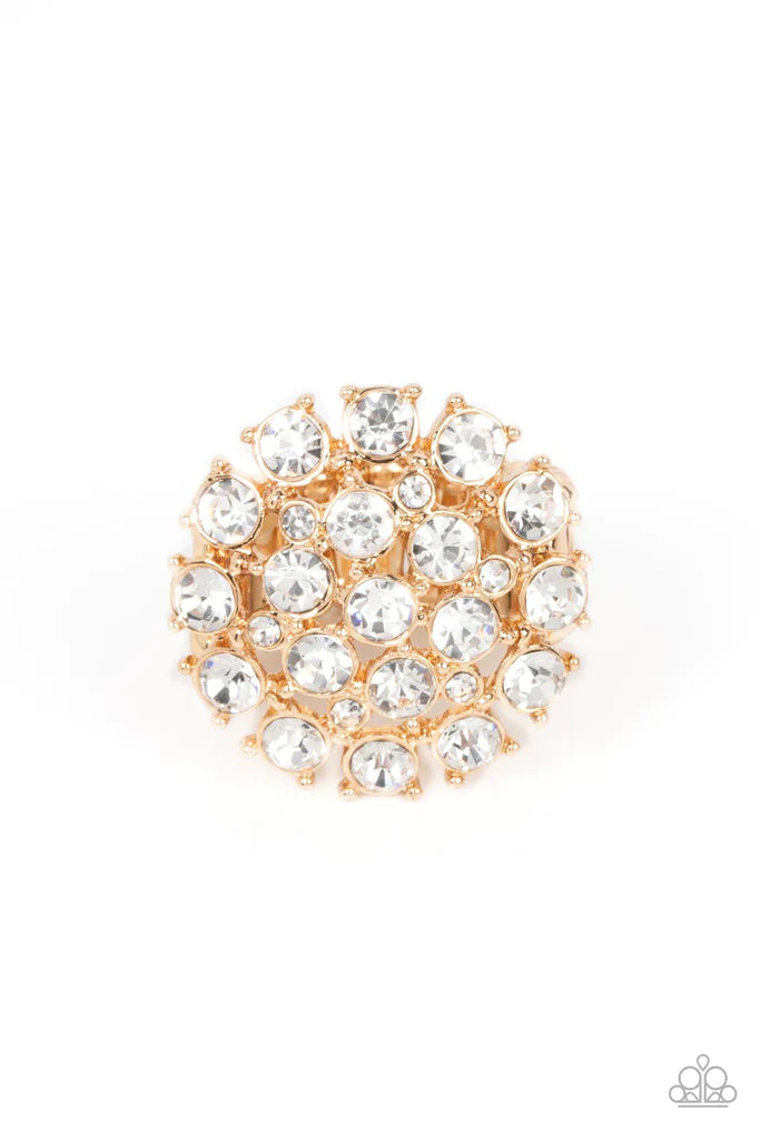 Paparazzi Accessories SELFIE-Confidence - Gold Featuring pronged gold fittings, an explosion of glassy white rhinestones sparkles atop the finger for a statement-making fashion. Features a stretchy band for a flexible fit. Sold as one individual ring. Jew