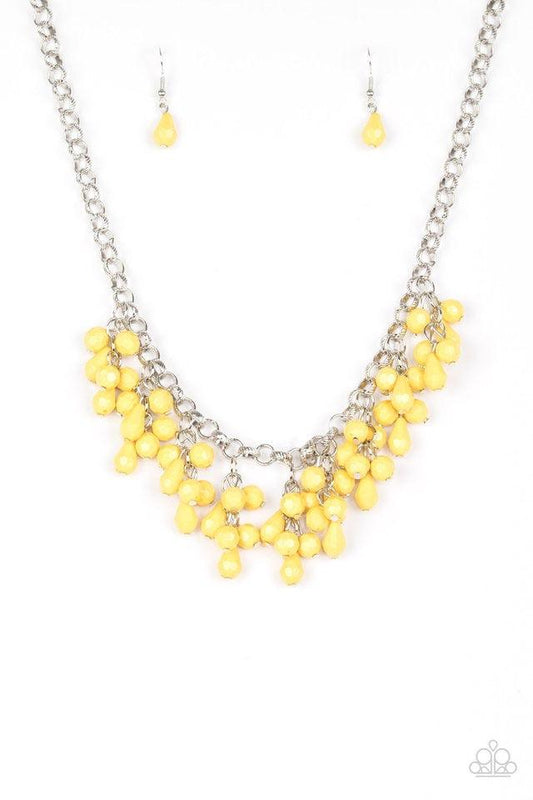 Paparazzi Accessories Modern Macarena - Yellow Featuring round and teardrop shapes, clusters of faceted yellow beads swing from the bottom of a shimmery silver chain, creating a playful fringe below the collar. Features an adjustable clasp closure. Jewelr