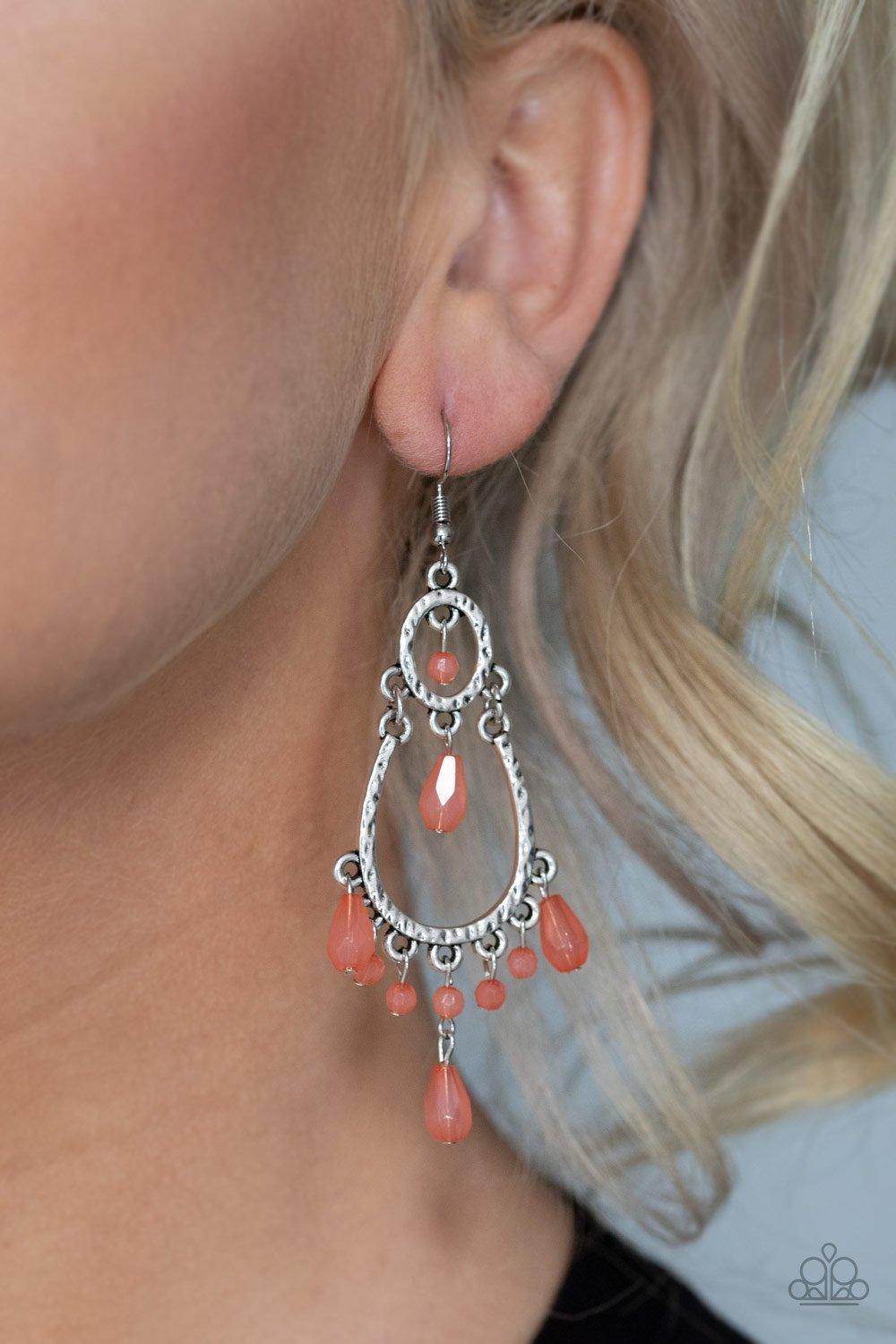 Paparazzi Accessories Summer Sorbet - Orange A collection of opaque coral crystal-like beads dangle from a stacked silver frame, creating a glistening fringe. Earring attaches to a standard fishhook fitting. Sold as one pair of earrings. Jewelry