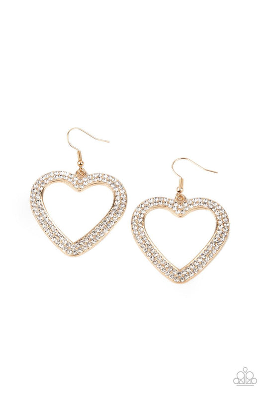 Paparazzi Accessories GLISTEN To Your Heart - Gold Two rows of glassy white rhinestones are encrusted along the front of a gold heart frame, creating a flirty centerpiece. Earring attaches to a standard fishhook fitting. Sold as one pair of earrings. Jewe