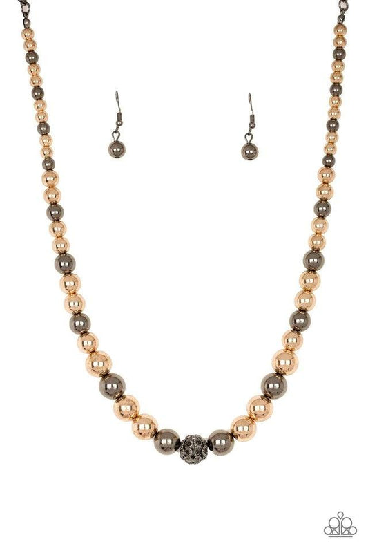 Paparazzi Accessories High Stakes FAME - Multi Gradually increasing in size near the center, glistening gold and gunmetal beads are threaded along an invisible wire below the collar. Encrusted in smoky rhinestones, a sparkling gunmetal bead adorns the cen