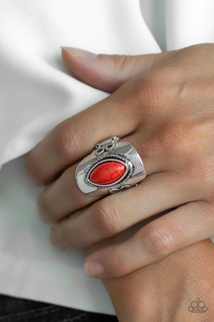 Paparazzi Accessories PLAIN Ride - Red Chiseled into a tranquil marquise shape, a fiery red stone is pressed into the center of an ornate silver frame as it folds around the finger. Features a stretchy band for a flexible fit. Sold as one individual ring.