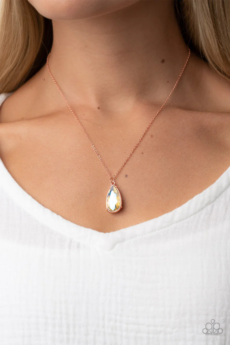 Paparazzi Accessories Interstellar Royal - Copper Encased in a shiny copper fitting, an iridescent teardrop gem glides along a dainty shiny copper chain below the collar for a stellar fashion. Features an adjustable clasp closure. Sold as one individual n
