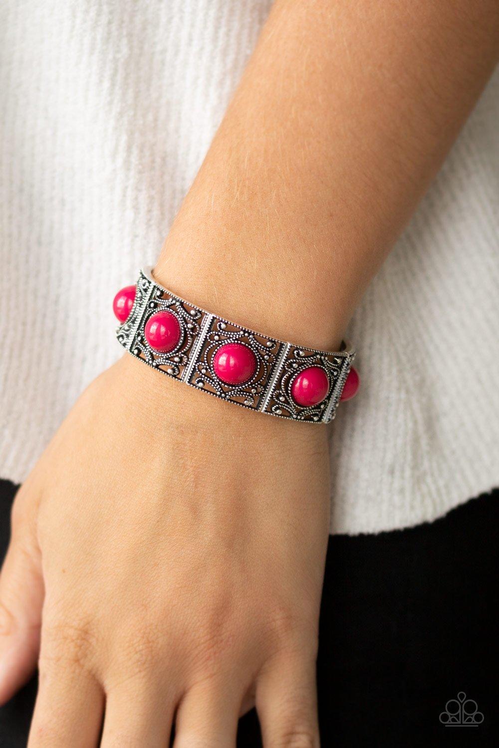 Paparazzi Accessories Victorian Dream - Pink Dotted with vivacious pink beads, shimmery silver filigree filled frames are threaded along a stretchy band around the wrist for a whimsical look. Sold as one individual bracelet. Jewelry