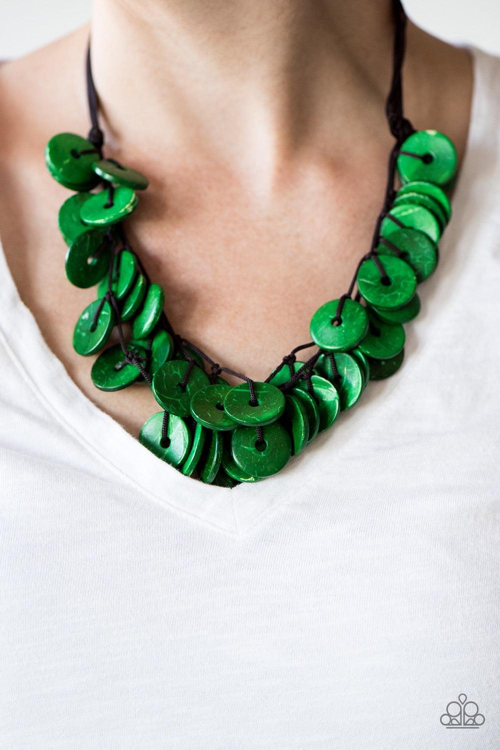 Paparazzi Accessories Jammin In Jamaica - Green Shiny wooden discs brushed in a refreshing green finish trickle along shiny brown cording, creating clustered layers below the collar. Features a button-loop closure. Jewelry