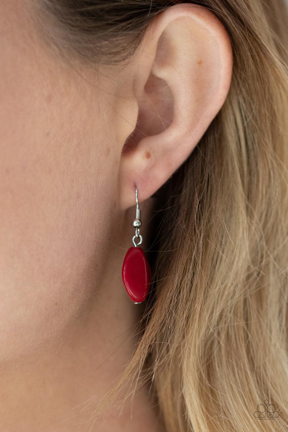 Paparazzi Accessories Two-Story Stunner - Red Two rows of dainty silver beads and faceted Samba faux stone beads alternate along invisible wires below the collar, creating bold, colorful layers. Features an adjustable clasp closure. Sold as one individual