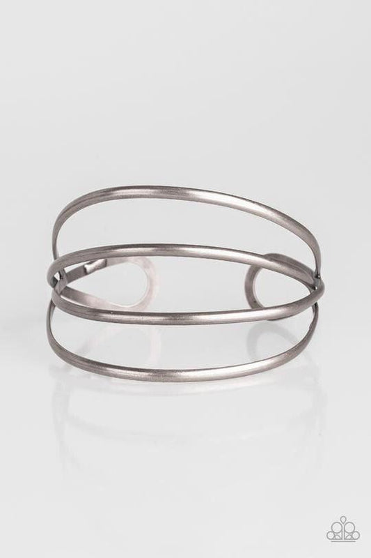 Paparazzi Accessories Take a CATWALK - Silver Glistening silver bars arc across the wrist, coalescing into an airy cuff. Sold as one individual bracelet. Jewelry