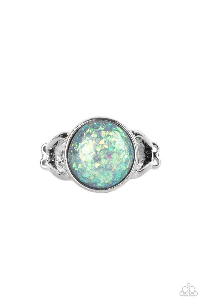 Paparazzi Accessories Glitter Grove - Silver An opalescent bead flecked with shimmering iridescent glitter is encased in a simple round silver frame creating a dazzling centerpiece atop the finger. Features a dainty stretchy band for a flexible fit. Sold