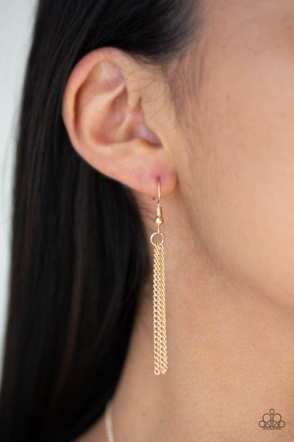 Paparazzi Accessories Santa Fe Simplicity - Black Chiseled into a tranquil almond-shape, an oversized black stone pendant swings from the bottom of a lengthened gold chain in a seasonal fashion. Features an adjustable clasp closure. Jewelry