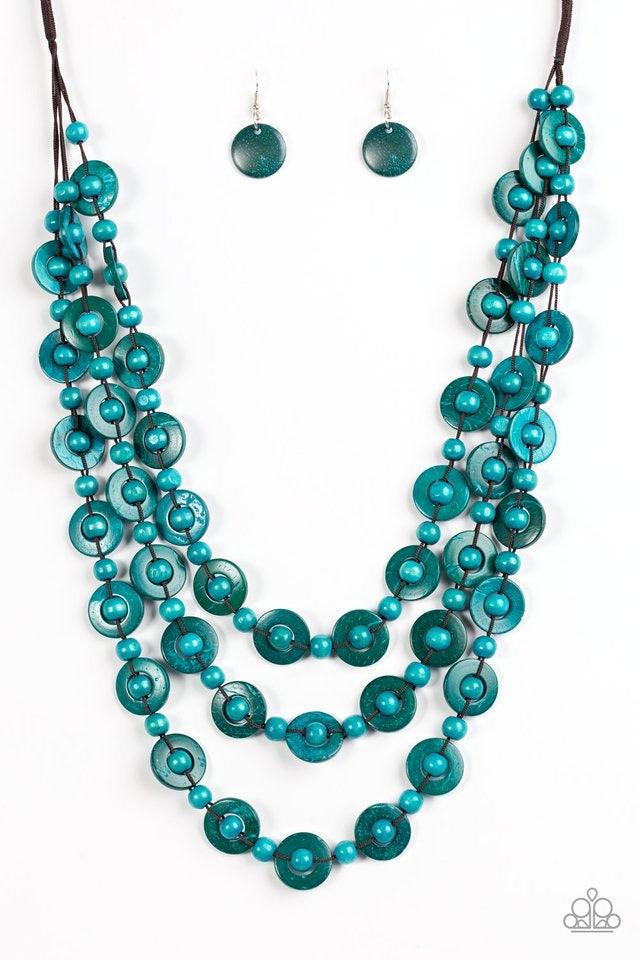Paparazzi Accessories Bermuda Belle - Blue Brushed in a refreshing blue finish, wooden rings and beads are knotted in place along three strands, creating summery layers down the chest. Features a button loop closure. Jewelry
