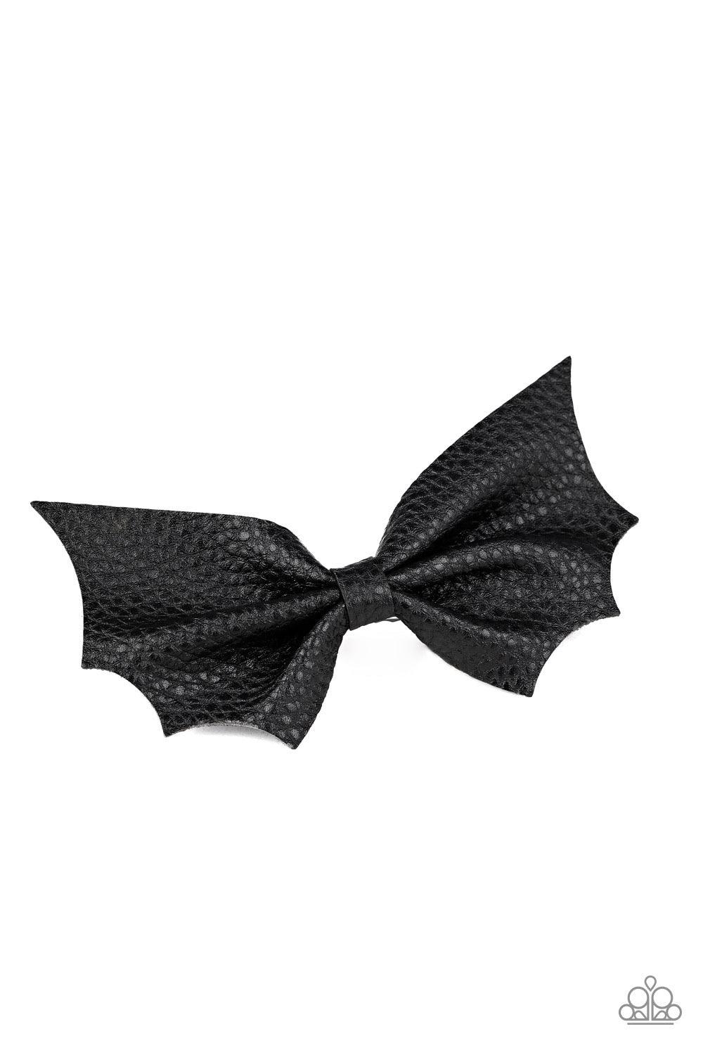 Paparazzi Accessories A Bit Batty - Black Featuring scalloped edges, a piece of black leather delicately knots into a spooky bat-like bow. Features a standard hair clip on the back. Sold as one individual hair clip. Brooches & Lapel Pins