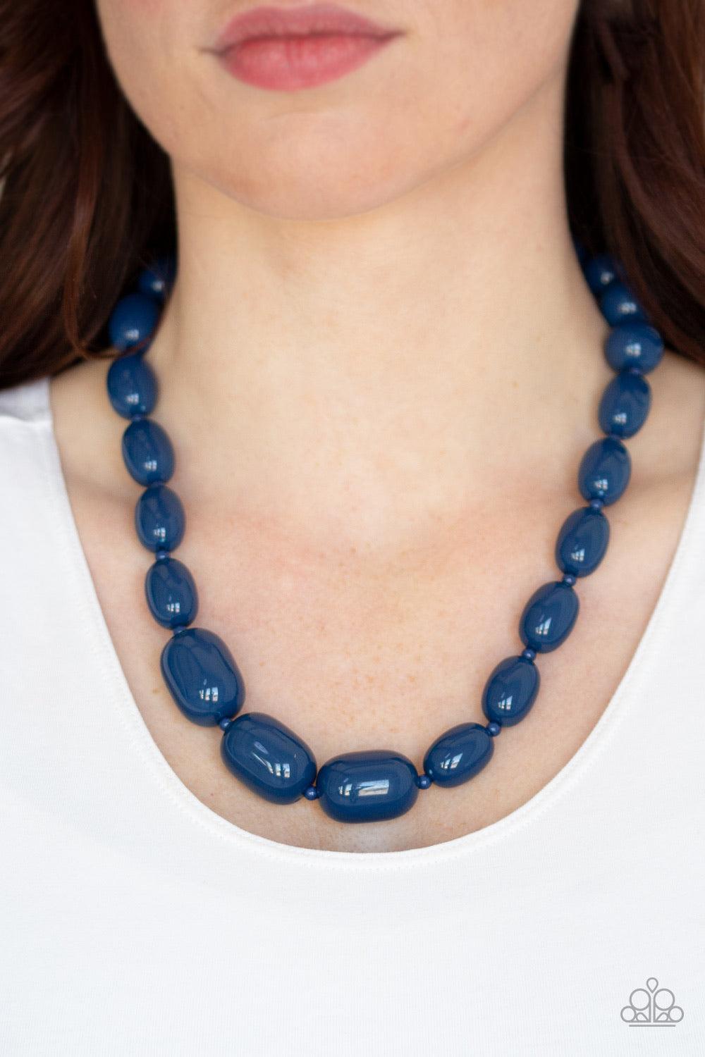 Paparazzi Accessories Poppin Popularity - Blue Infused with dainty Evening Blue beads, round Evening Blue beads trickle into bold oval beads, creating a bold pop of color below the collar. Features an adjustable clasp closure. Jewelry