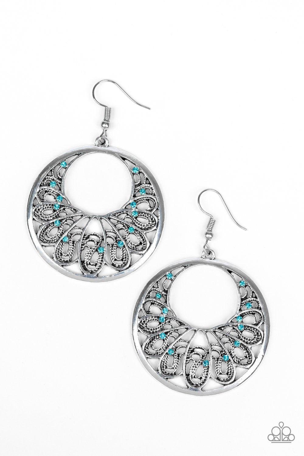 Paparazzi Accessories Fancy That - Blue Dainty blue rhinestones are sprinkled along a shimmery silver frame swirling with filigree filled petals for a whimsical look. Earring attaches to a standard fishhook fitting. Jewelry