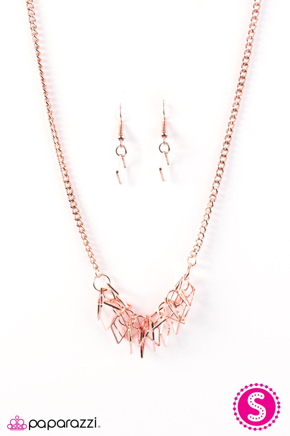 Paparazzi Accessories Beast Mode - Copper A thick copper chain gives way to a clustered fringe below the collar. Featuring a shiny copper finish, dainty diamond-shaped silhouettes swing from the bottom of the chain, creating a fierce fringe. Features an a