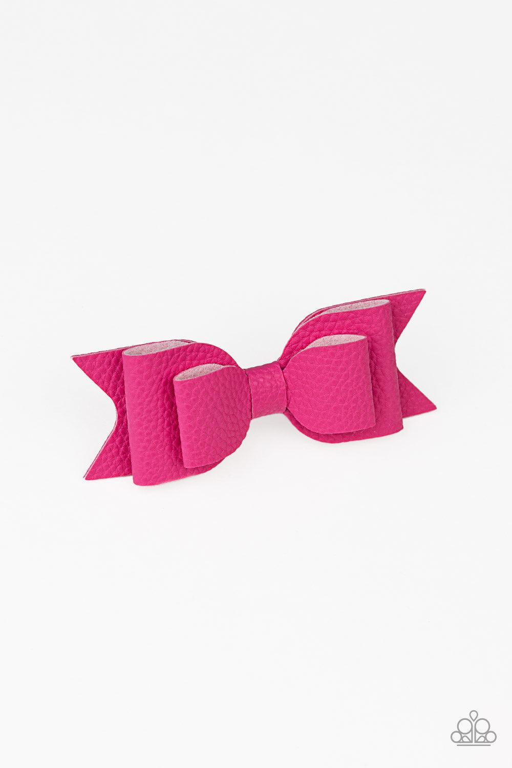 Paparazzi Accessories Bow Wow Wow - Pink Painted in a flamboyant pink finish, textured leather ties into a flirtatious hair bow. Features a standard hair clip on the back. Hair Accessories