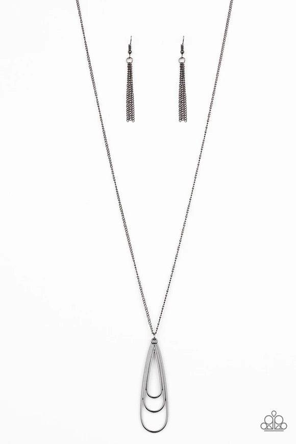 Paparazzi Accessories The Big Three - Black Gradually increasing in size, glistening gunmetal teardrops coalesce into a rippling frame for an edgy look. The airy pendant swings from the bottom of a lengthened gunmetal chain for an edgy look. Features an a