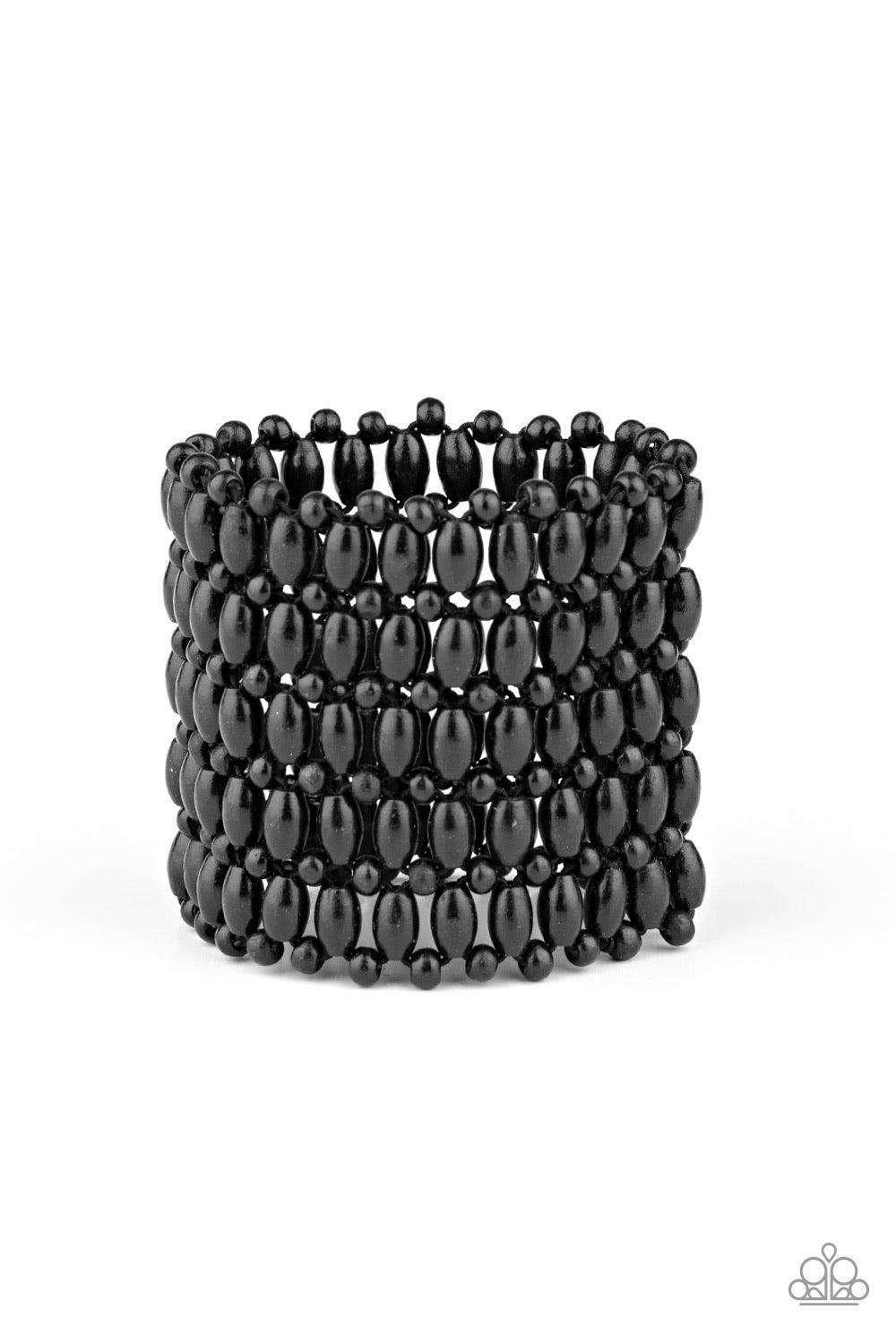 Paparazzi Accessories Way Down In Kokomo ~Black Round and oval black wooden beads are threaded along stretchy bands that intricately weave around the wrist, coalescing into a colorful stretch bracelet. Sold as one individual bracelet.