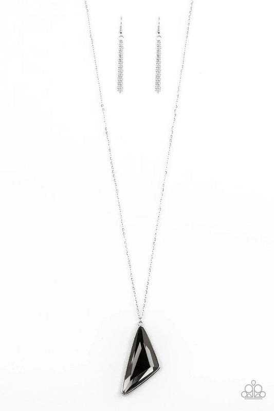 Paparazzi Accessories Ultra Sharp - Silver Cut into a striking triangular shape, a faceted smoky gem swings from the bottom of a lengthened silver chain for an edgy-glamorous fashion. Features an adjustable clasp closure. Sold as one individual necklace.