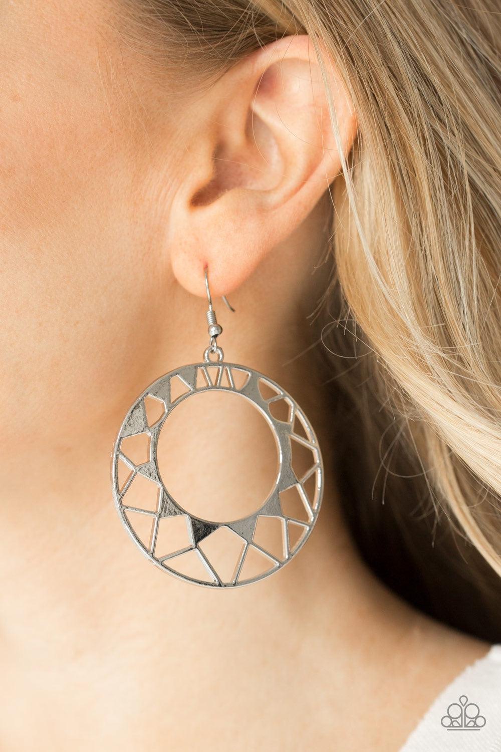 Paparazzi Accessories Summer Sunshine - Silver Brushed in a high-sheen finish, a shattered sunburst pattern bursts from a silver hoop for a summery look. Earring attaches to a standard fishhook fitting. Jewelry